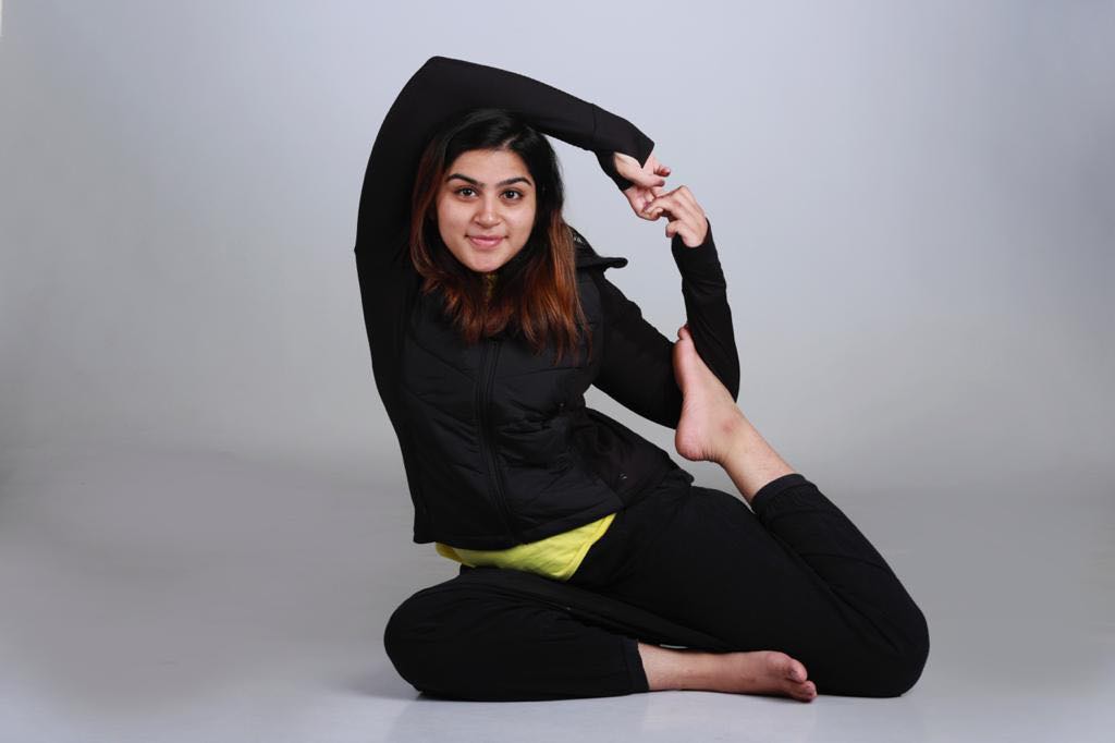 Prerna Narayanan in the mermaid yoga position