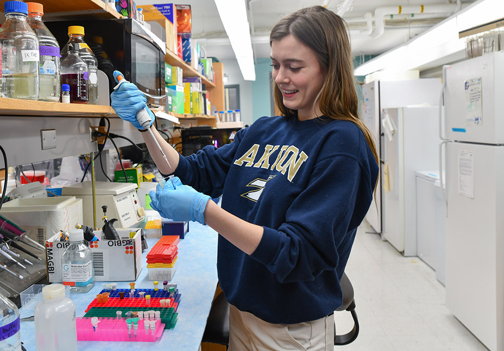 Student Miranda Brainard in a lab at The University of Akron